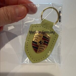 NIB Porsche Crest Leather Keychain - Cartagena Yellow Metallic - Made in Germany